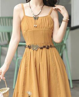 A sundress in muted yellow linen