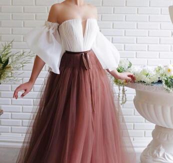 An off-shoulder gown in contrasting tulle