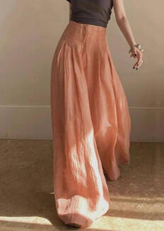 Palazzo-style pants in peach linen