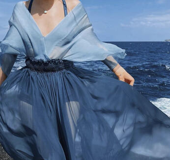 A billowy cover-up dress in ocean hues